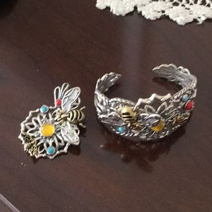 A beautiful pendant and cuff bracelet.